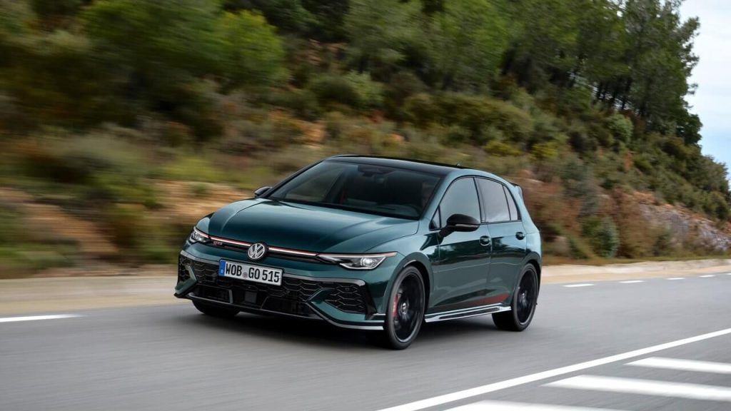 Green VW Golf Gti cruising thorugh the outdoors
